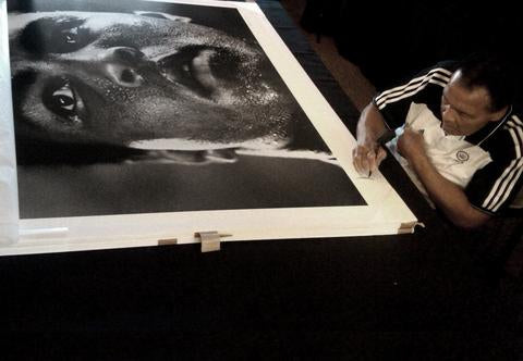 Muhamad Ali 1977 by Michael Brennan signed by Ali